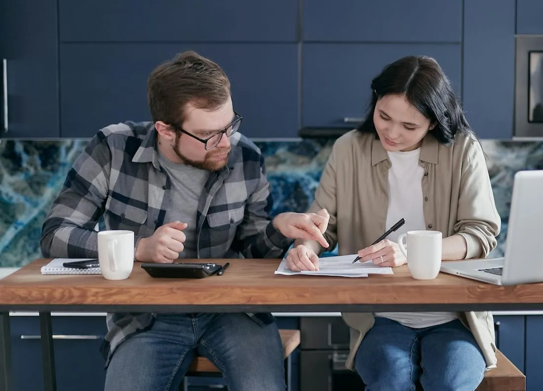 Couple sitting on a table